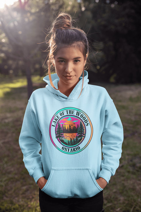Featuring a stunning lake scene with a vibrant sunset, this hoodie captures the beauty of Lake of the Woods in Ontario, where tranquil waters meet the warm glow of a setting sun.